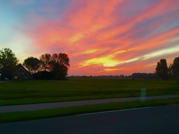Scenic view of landscape at sunset