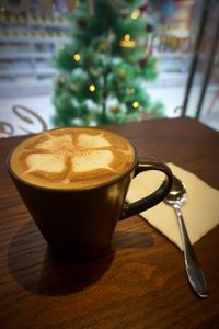 Close-up of coffee cup on table