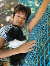 Portrait of cute girl with dog
