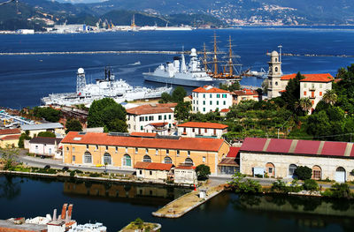 High angle view of residential buildings harbor on sea