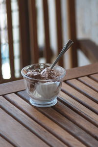 Close-up of ice cream in glass on table