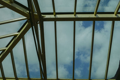 Low angle view of metallic structure against sky