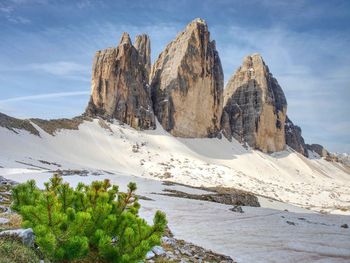 Killing beauty of high mountains. spring tour in famous alps range. hiking by path covered by snow