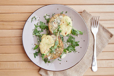 Vegan muffins with tofu, pea sprouts, herbs, almond flakes and vegetables. healthy breakfast