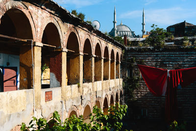 Panoramic view of historic building against sky