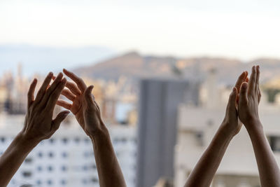 Close-up of hand against blurred background