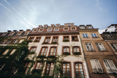 Low angle view of residential building against sky