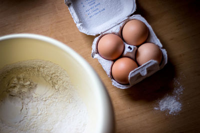 High angle view of eggs in bowl on table