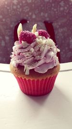 Close-up of cupcakes on table