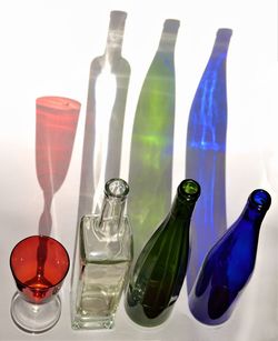 Close-up of wine bottles on table