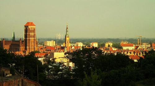 Buildings against clear sky