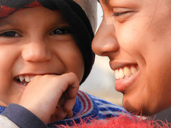 Close-up of smiling mother and boy 