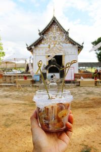 Midsection of person holding ice cream