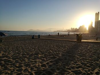 Scenic view of beach against clear sky