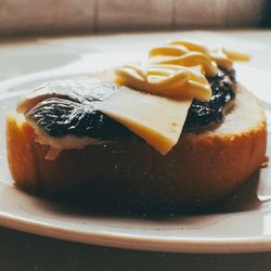 Close-up of cake slice in plate on table