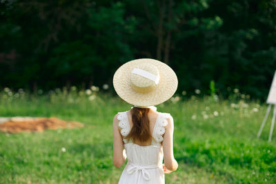 Rear view of woman wearing hat