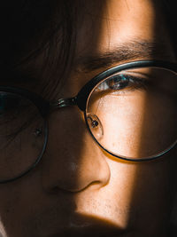 Close-up portrait of man with eyeglasses