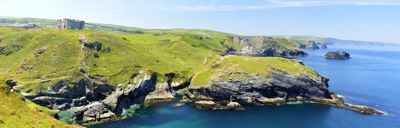 Panoramic view of sea and rocks against sky