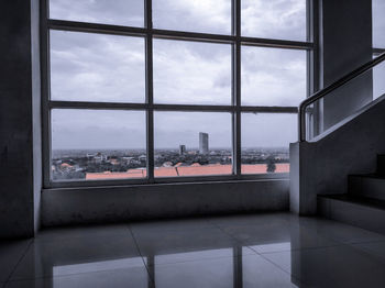 Buildings seen through window