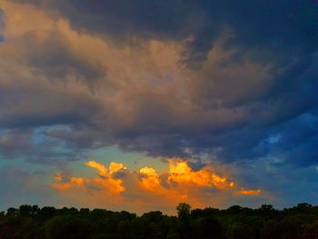 Low angle view of dramatic sky during sunset