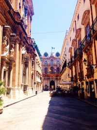 Alley amidst buildings in city