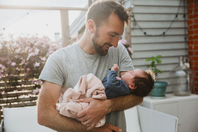 Father holding baby girl