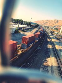 Train on railroad track against sky