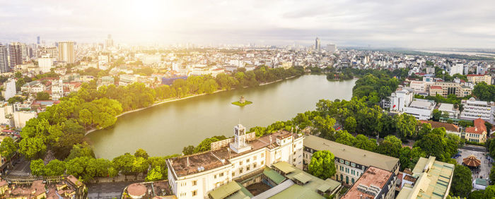 High angle view of river amidst buildings in city