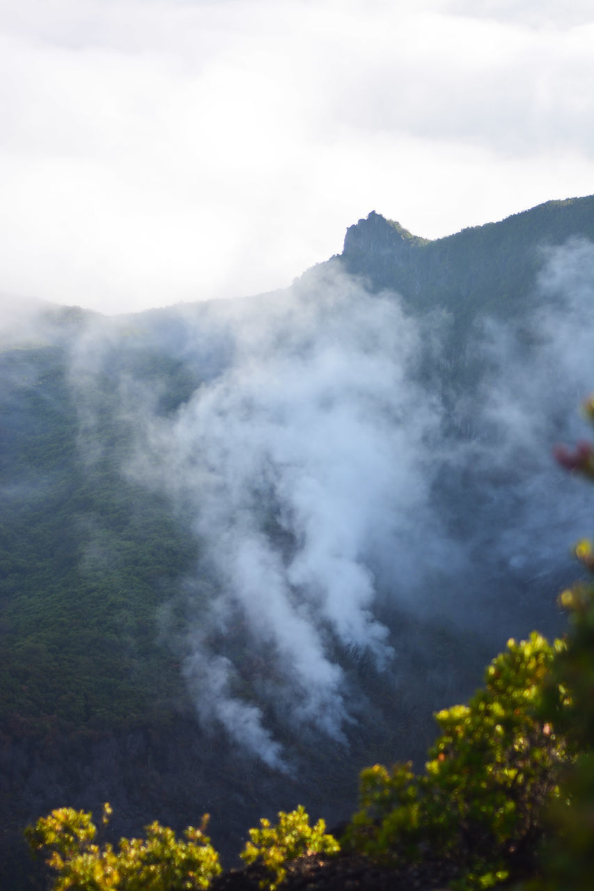 SMOKE EMITTING FROM MOUNTAIN