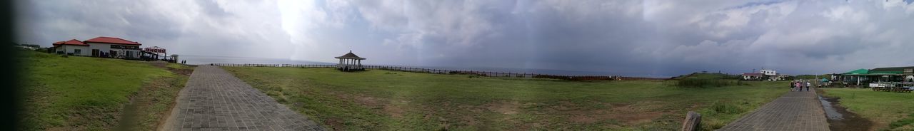 Panoramic view of road leading towards sea