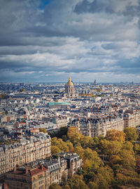 Scenery aerial view from the eiffel tower height over the paris city, france. les invalides building