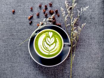 Directly above shot of coffee cup on table