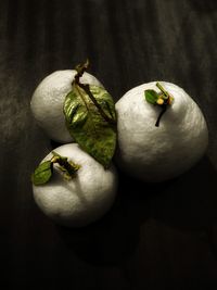 High angle view of green fruits on table