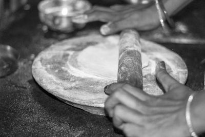 Close-up of man preparing food