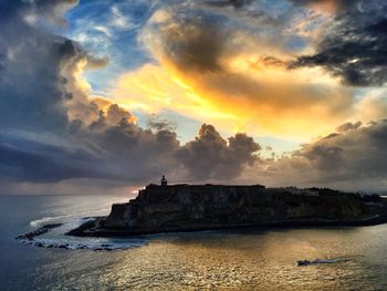 Scenic view of sea against cloudy sky