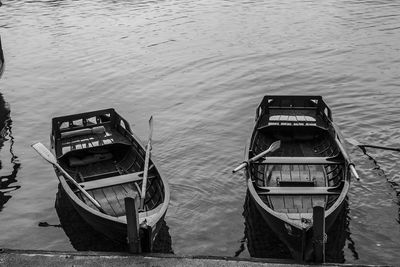 Boat moored on lake