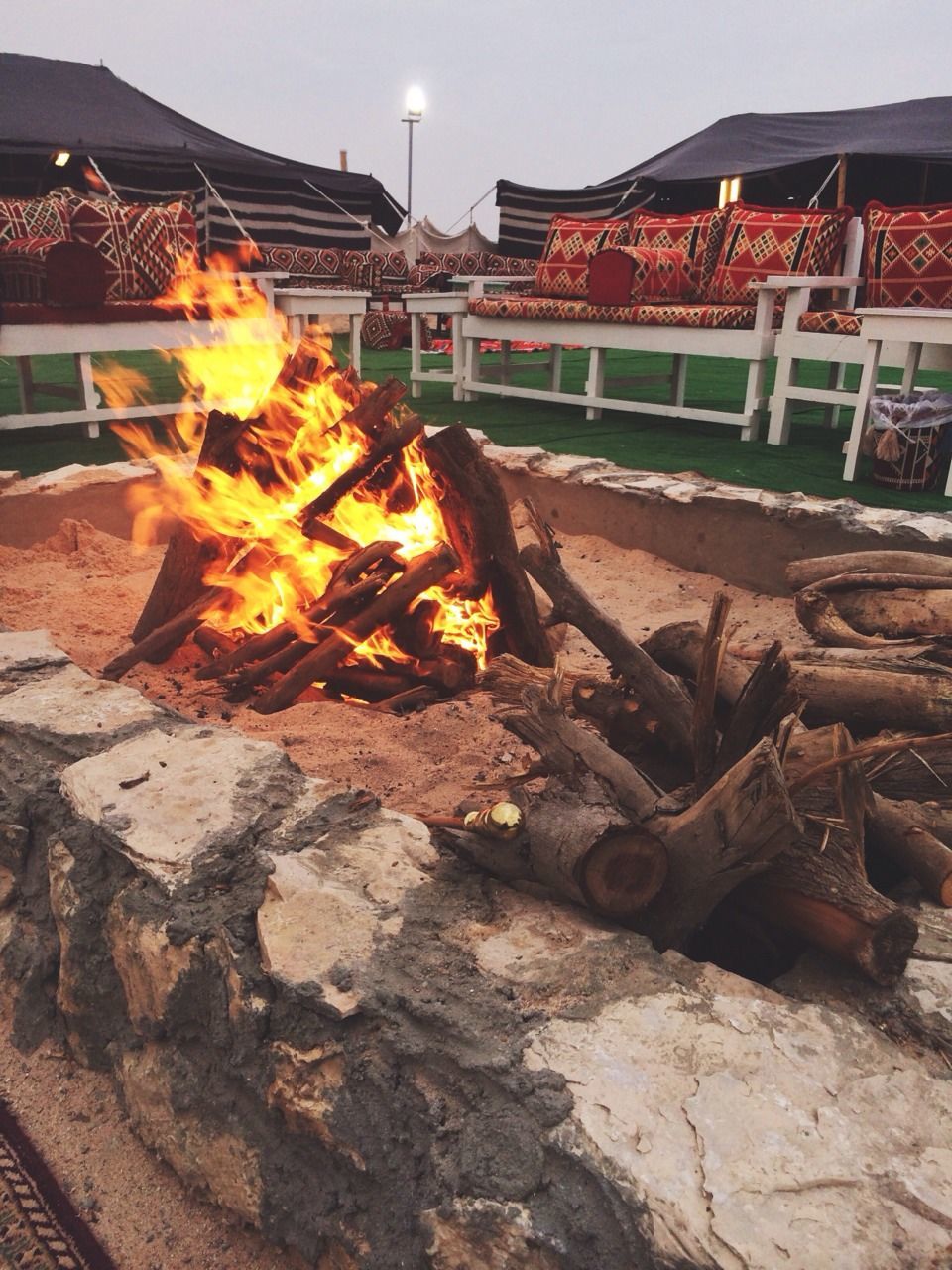 built structure, fire - natural phenomenon, building exterior, heat - temperature, flame, architecture, burning, firewood, outdoors, metal, barbecue, barbecue grill, factory, sunlight, industry, no people, construction site, obsolete, transportation, damaged