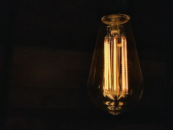 Close-up of illuminated light bulb