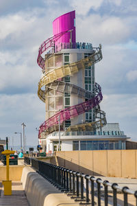 Built structure against cloudy sky