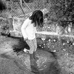 Woman standing in water