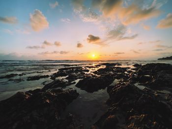 Scenic view of sea against sky during sunset