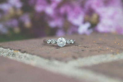 Close-up of wedding rings on surface