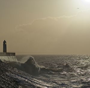 Scenic view of sea against sky during sunset