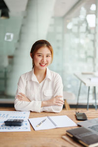 Businesswoman working at desk in office