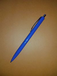 Close-up of pen on table