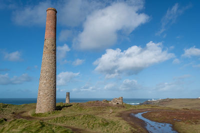 Landscape photo of disused industrial chimneys from the mining industry on the cornish coast