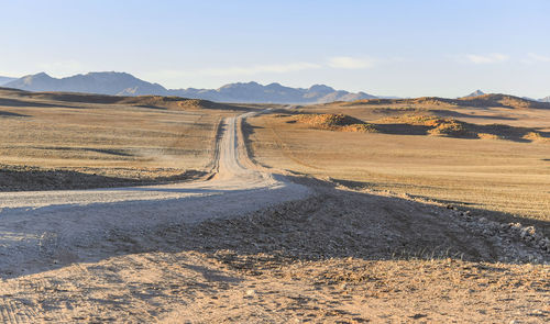 Scenic view of land against sky