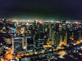 Illuminated cityscape at night