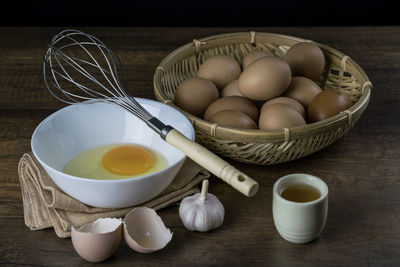 Close-up of eggs in basket on table