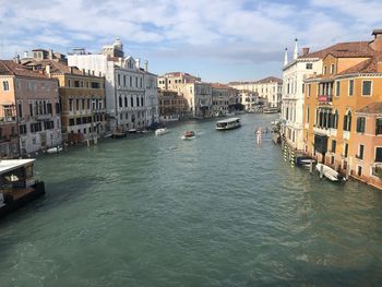 Canal passing through city buildings